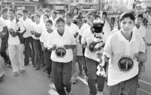 Creating awareness:Students of Salem Periyar University carrying the torch in Salem